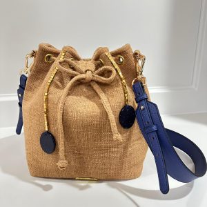 Light brown with sandstone (two blue glitter stones) and Hematite (small golden beads in a line ending with the blue stones)