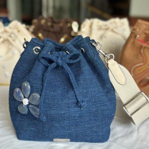 The blue bag with the flower