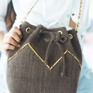 The Dark Brown bag with the golden beads.