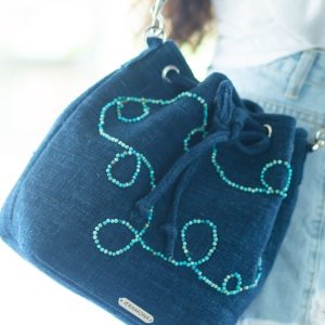 The Blue bag with little light blue beads.